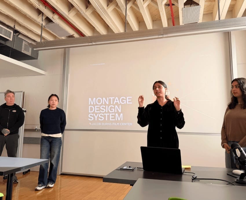The team posing in front of MONTAGE DESIGN SYSTEM screen